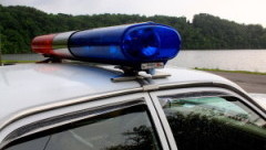 12729-lights-on-the-top-of-a-police-car-pv-300x200